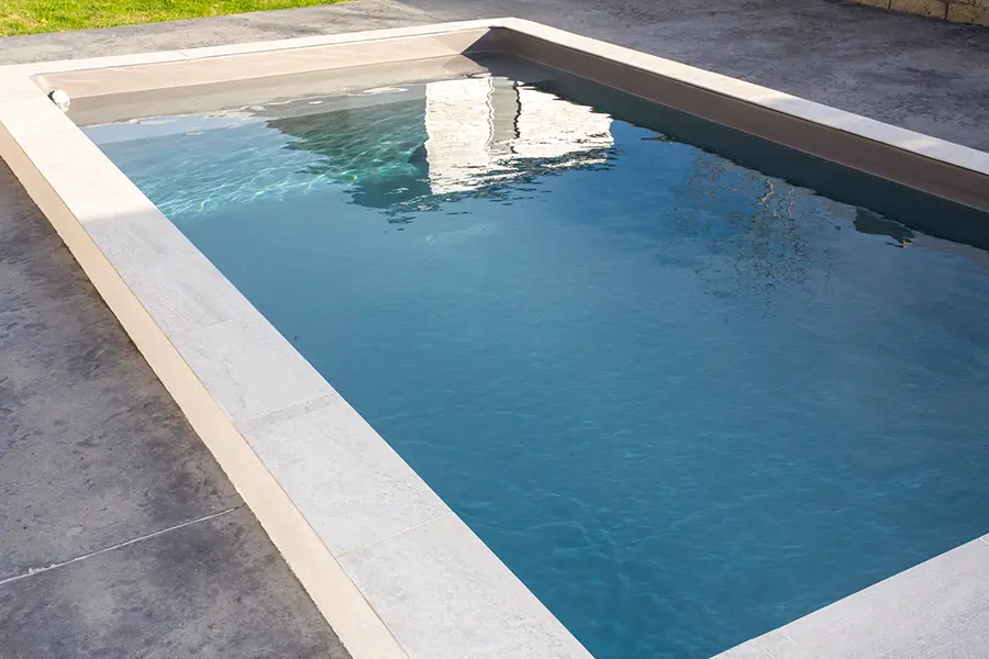 Benefits of Replacing Old Pool Coping for Safety Tyler TX